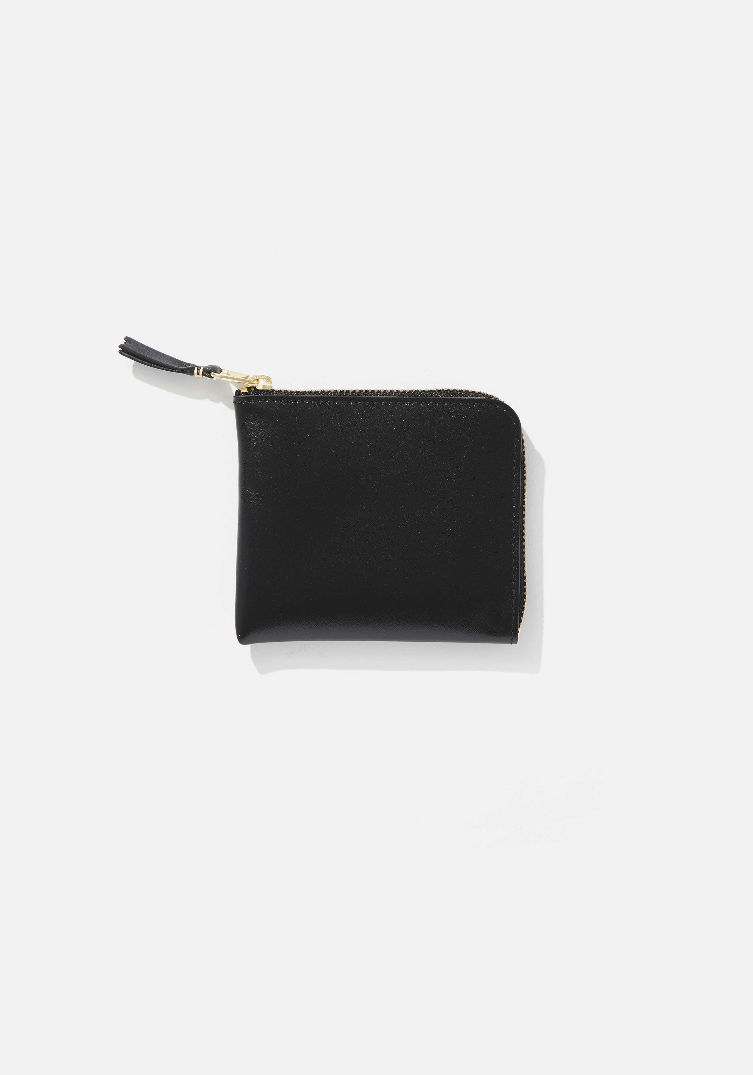 COMME DES GARCONS HALF ZIP WALLET