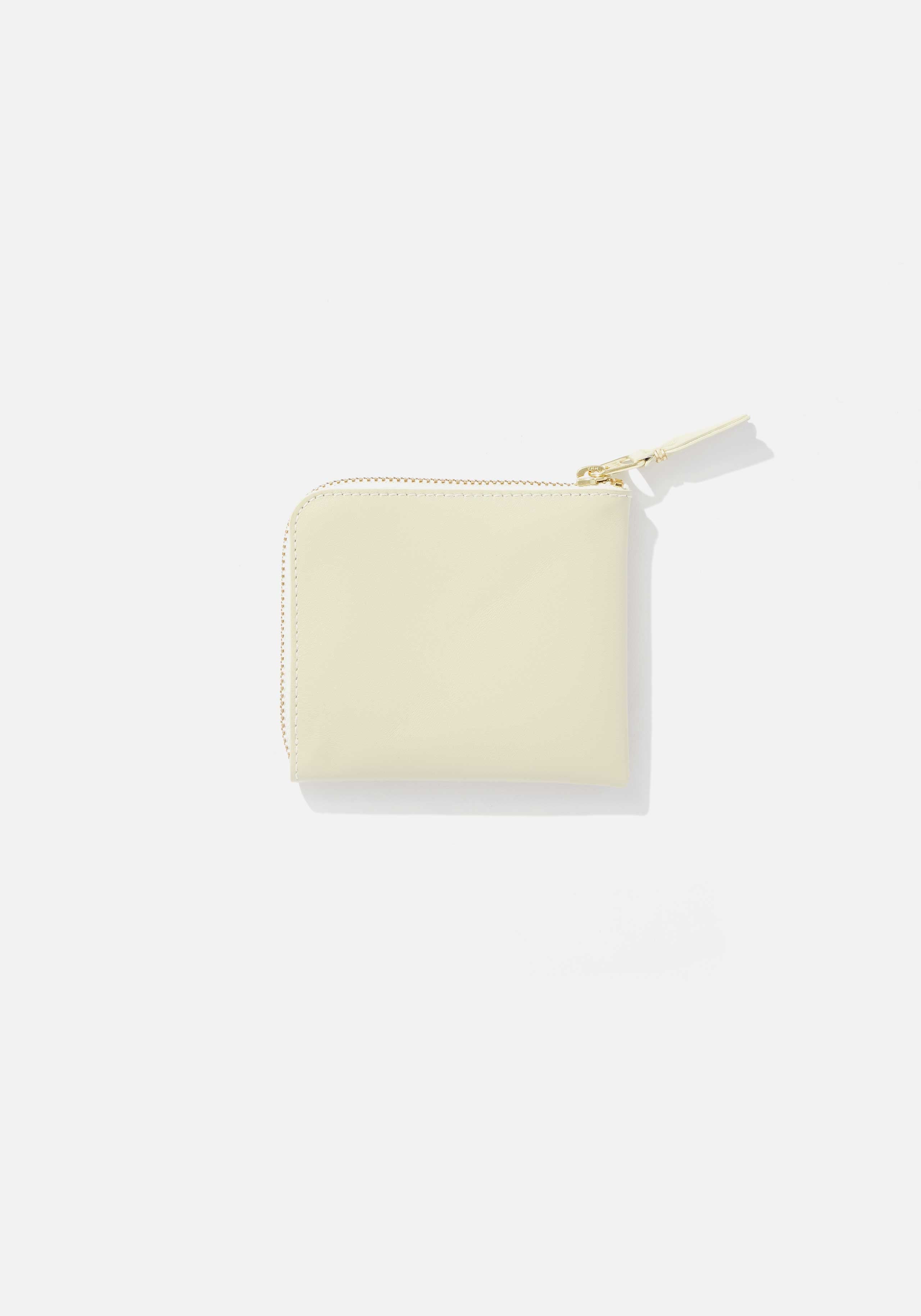 COMME DES GARCONS HALF ZIP WALLET